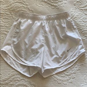 White Nike shorts